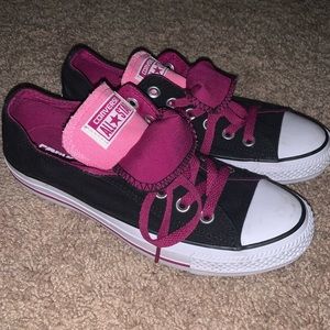 Purple pink and black converse.